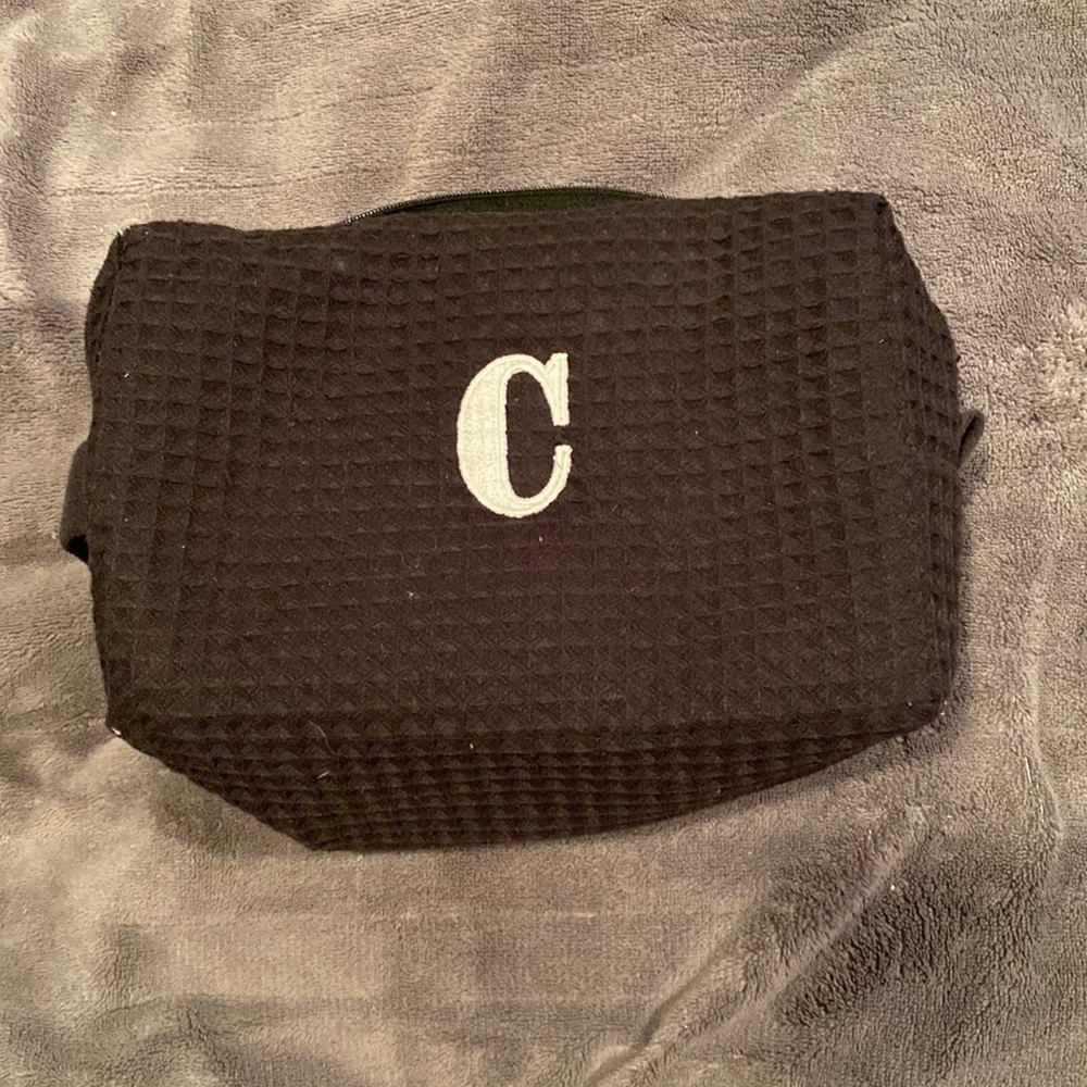 Makeup bag with “C” on it